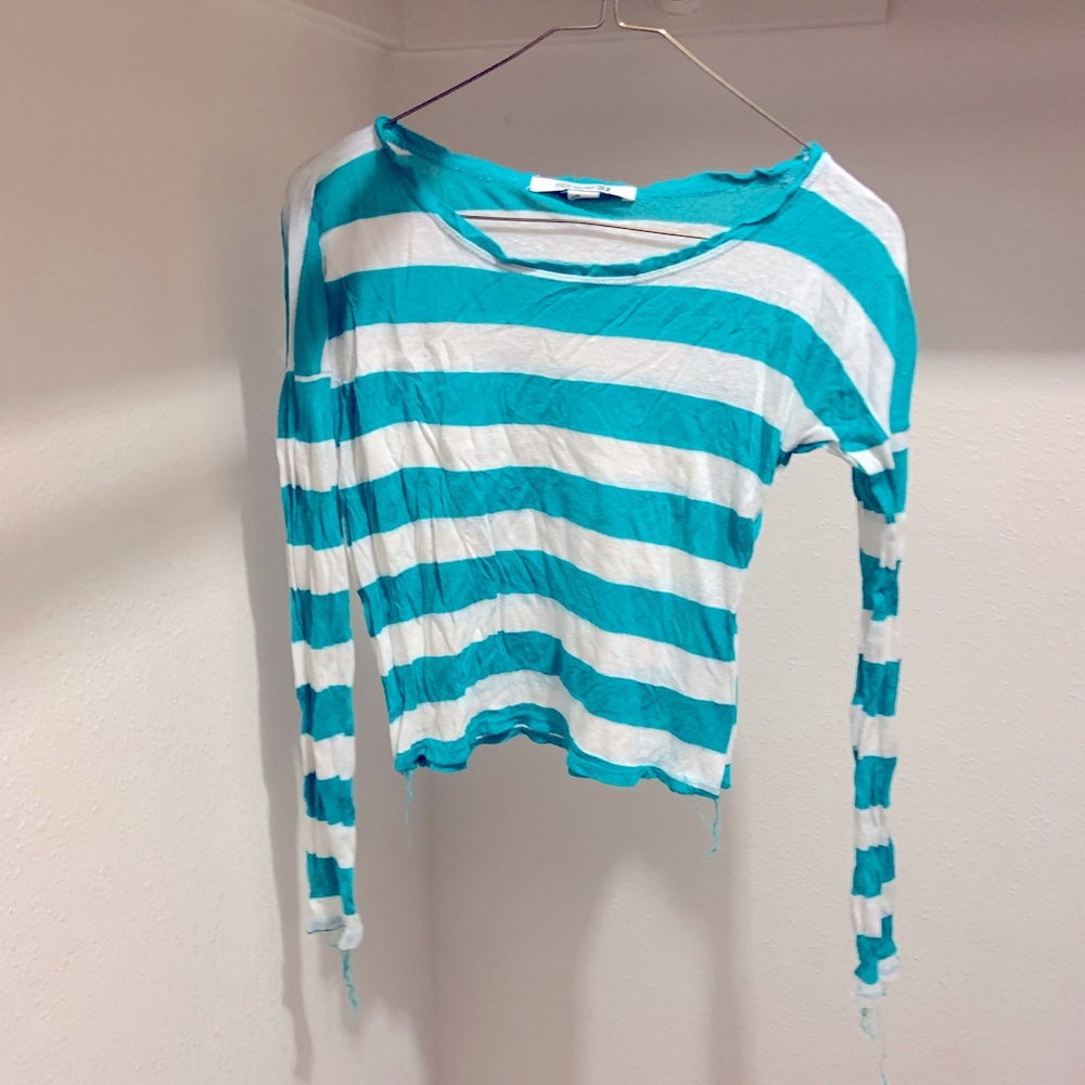 Blue and white stripped shirt.